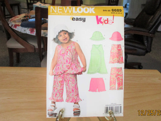 NEW LOOK EASY  pattern new condition uncut girls , 5 styles sizes 1.5 to4