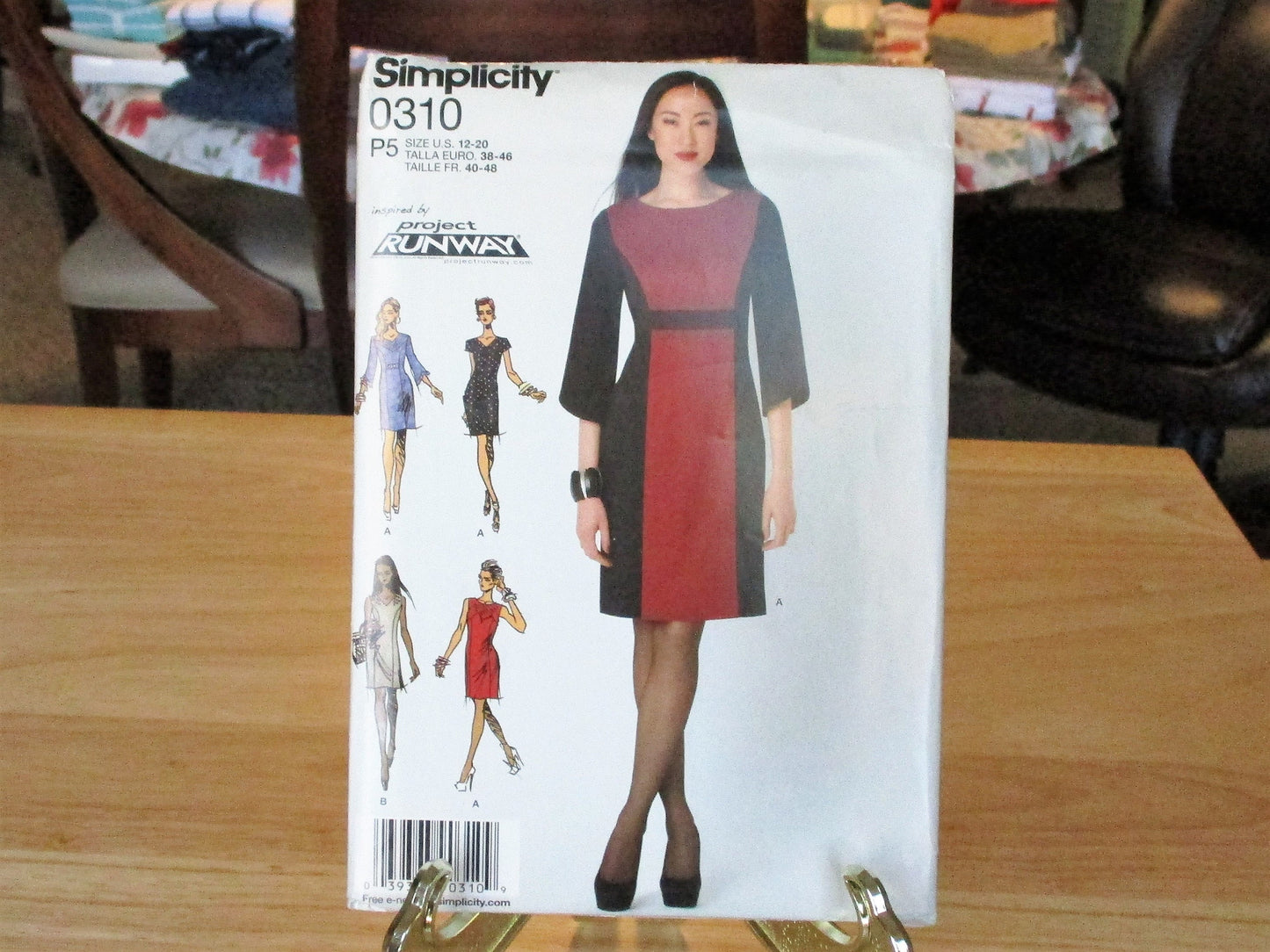 SMPLICITY PROJECT RUNWAY pattern is  new condition uncut  12-20